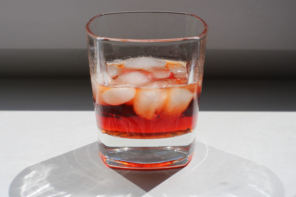 Boulevardier in a glass with ice, this is one of the most popular French alcoholic beverages.